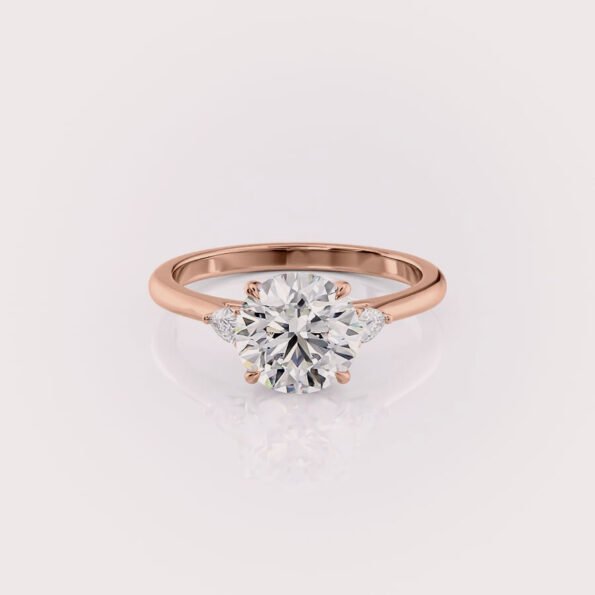 2.5ct round cut lab diamond three-stone engagement ring