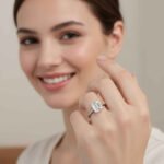 Emerald cut 6 carat lab diamond solitaire ring in 18K yellow gold – front view on matte background