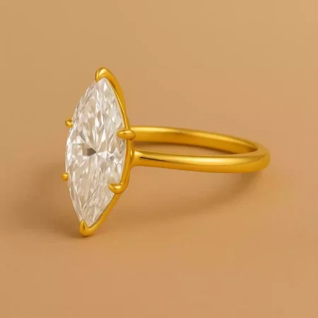 Side angle of marquise cut 5 carat lab diamond solitaire ring in 18K yellow gold – sleek solitaire profile