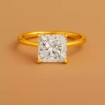 Front view of 6 carat princess cut lab diamond solitaire ring in yellow gold – square diamond with four-prong setting