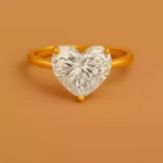 Front view of 5 carat heart cut lab diamond solitaire ring in yellow gold – classic three-prong setting