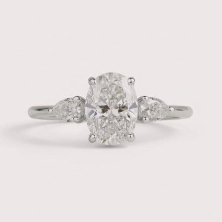 3.00ct Oval Lab Diamond Ring with Pear Side Stones in 14K Gold – Minimalist Three Stone Setting