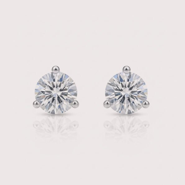 Round cut lab-grown diamond stud earrings in three-prong setting on white gold – front view