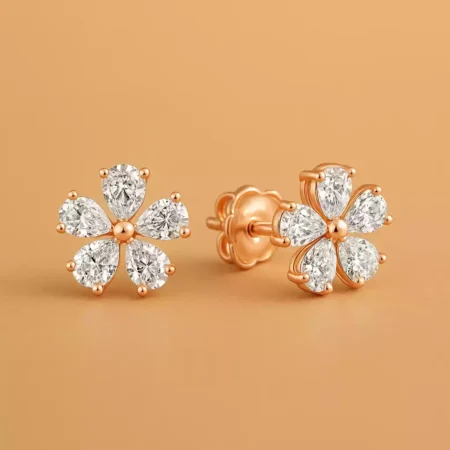 Rose gold floral stud earrings with pear-shaped lab-grown diamonds and secure screw back closure – front and side view