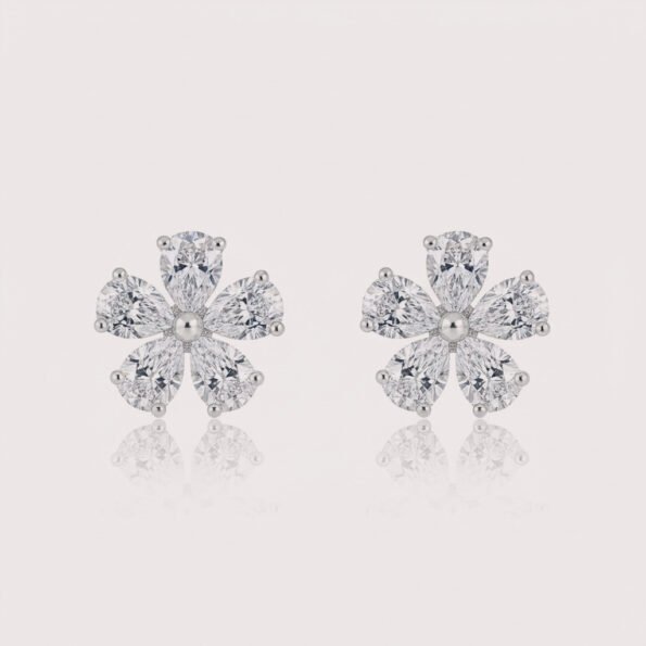 Pear-cut diamond flower cluster earrings in white gold – symmetrical five-petal floral design