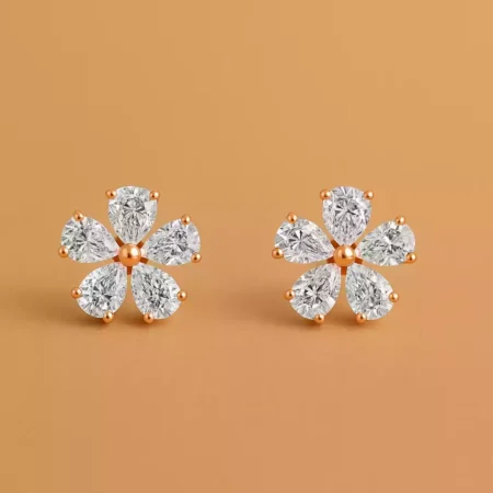 Pear-cut diamond flower cluster earrings in rose gold – symmetrical five-petal floral design