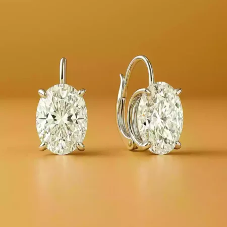 Oval lab-grown diamond drop earrings with curved latch back closure in white gold – front and side view