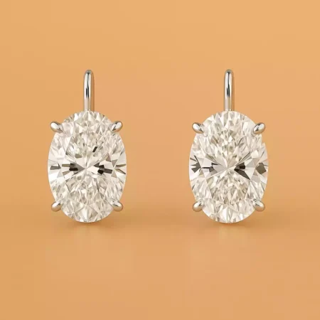 Oval cut lab-grown diamond drop earrings in white gold with four-prong setting – front view on plain background