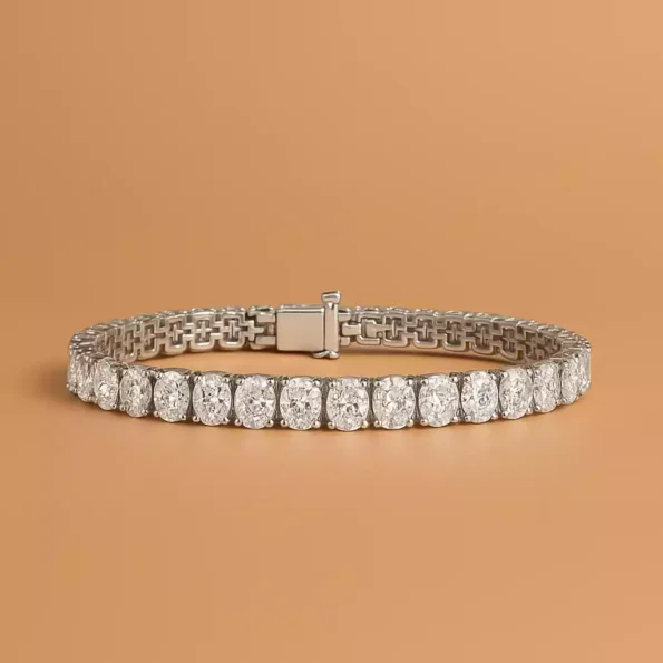 Oval cut lab-grown diamond tennis bracelet in white gold with box clasp – front product view