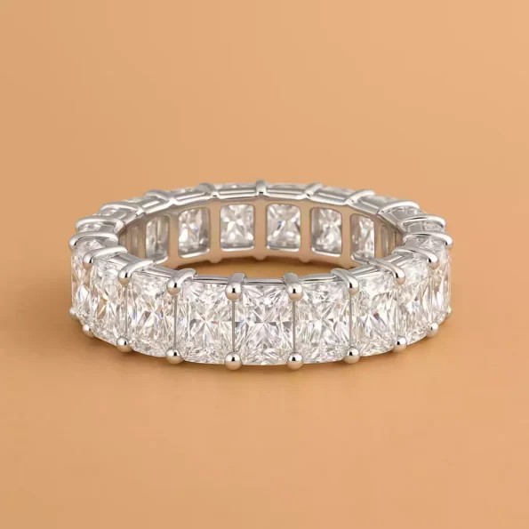 Close-up of radiant cut diamond eternity ring in white gold – luxurious prong-set lab-grown stones in full circle