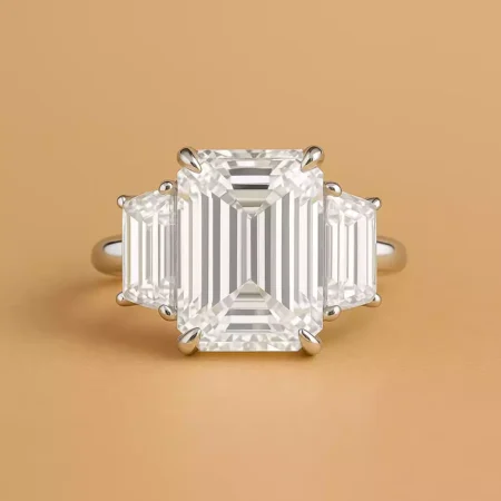 8.05ct Emerald Cut Lab Grown Diamond Three Stone Engagement Ring with Trapezoid Side Stones in 10K/14K/18K Gold – IGI Certified