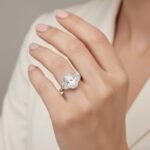4.31ct EF VS1 IGI Certified Oval Cut Lab Diamond Three Stone Engagement Ring in 14K Gold – Trapezoid Side Stones