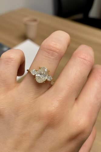 2 Carat Oval Cut Lab Grown Diamond Engagement Ring with Pear Side Stones in 10K/14K/18K Gold – IGI Certified photo review