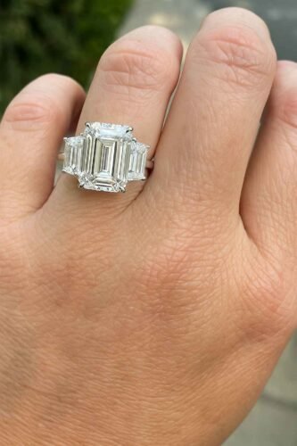 Click to view full screen 8.05ct Emerald Cut Lab Grown Diamond Three Stone Engagement Ring with Trapezoid Side Stones in 10K/14K/18K Gold – IGI Certified photo review