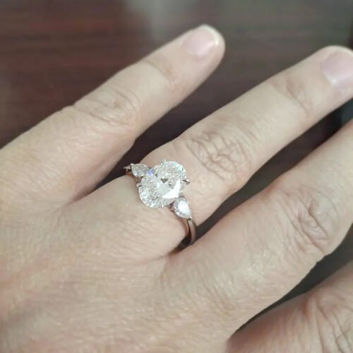 2 Carat Oval Cut Lab Grown Diamond Engagement Ring with Pear Side Stones in 10K/14K/18K Gold – IGI Certified photo review