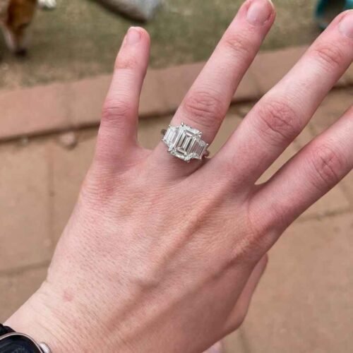 4.05ct Emerald Cut Lab Grown Diamond Three Stone Engagement Ring with Trapezoid Side Stones in 10K/14K/18K Gold – IGI Certified photo review