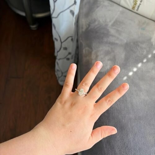 Click to view full screen 1.80 carat Oval Cut Lab Grown Diamond & Marquise side diamonds Engagement Ring 14K Gold IGI Certified photo review