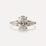 2.03 Ct Oval Step Cut Lab Grown Diamond 3 Stone Engagement Ring Pear Side Stones 14K Gold VS1 Certified