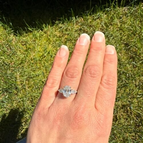 2.03 Ct Oval Step Cut Lab Grown Diamond 3 Stone Engagement Ring Pear Side Stones 14K Gold VS1 Certified photo review