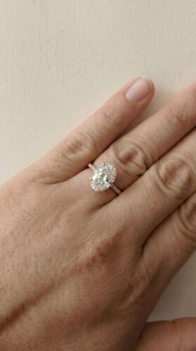 Click to view full screen 3 Carat Oval Cut Lab Grown Diamond & Side Pave Round Cut Diamonds Engagement Ring 14K Rose Gold E/VVS1 IGI Certified photo review